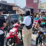 Cegah Dampak Abu Vulkanik DPD PSI Kanupaten Bogor Bagikan Masker